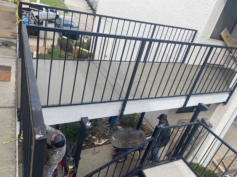 Catwalk and balcony concrete repair in progress