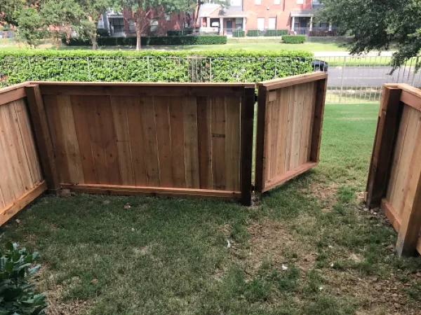 Wood pet yard enclosure for multifamily community